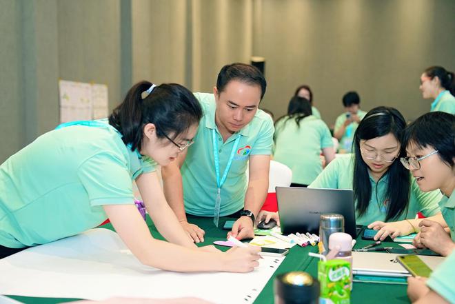 九游娱乐网站：浇灌希望之树点亮教育之光：伊利行知计划·第五届乡村教师赋能培训启动(图5)